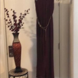 Burgundy jumpsuit with gold and burgundy belt